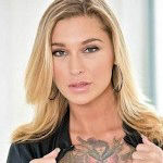 Busty babe with crazy tattoos pounded in an interracial shower scene