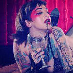 Tattooed slut Sully Savage is hungry for a pounding